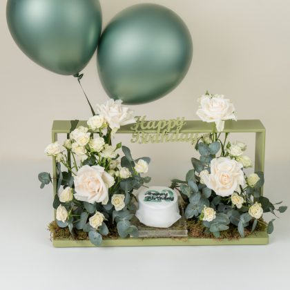 Green HBD box with cake