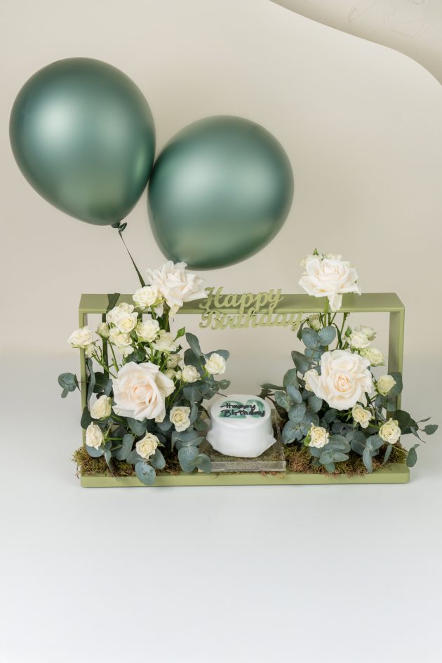 Green HBD box with cake
