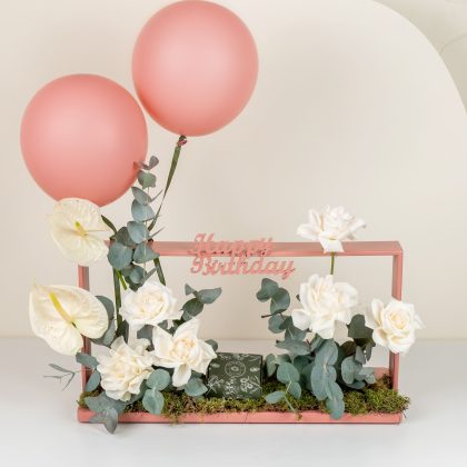 Peach balloon and chocolate box