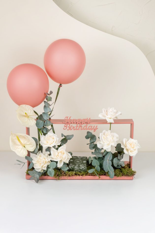 Peach balloon and chocolate box
