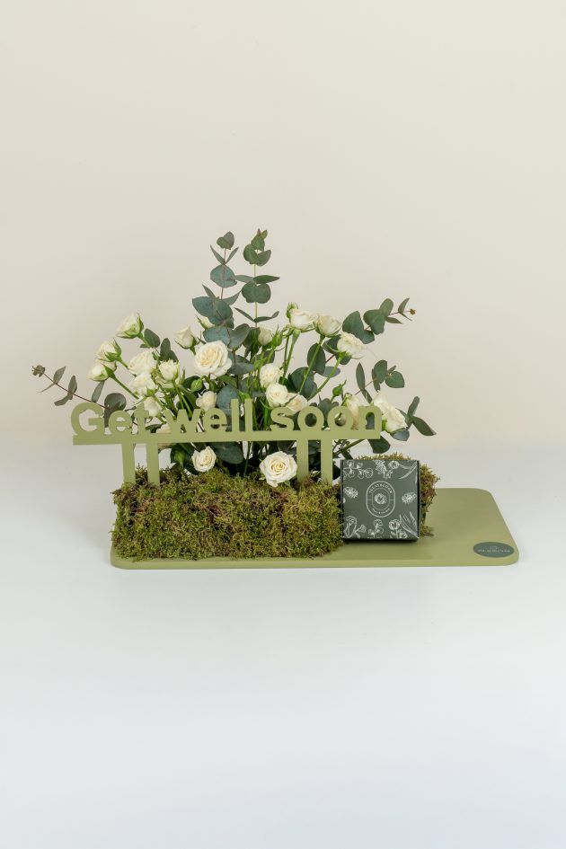 White baby roses and chocolate tray