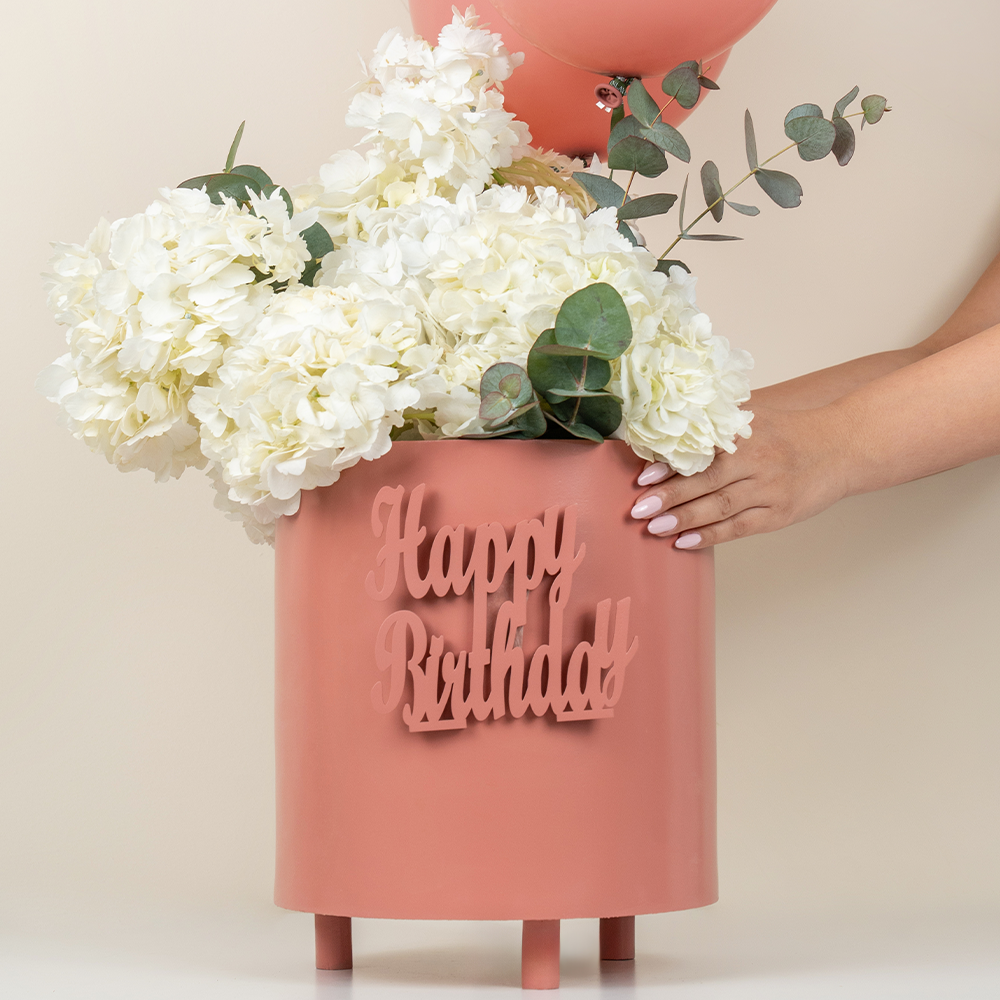 Peach balloons and flowers