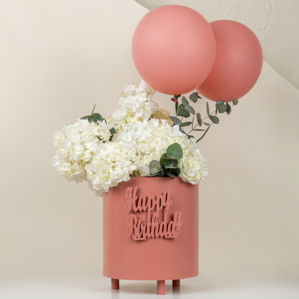 Peach balloons and flowers